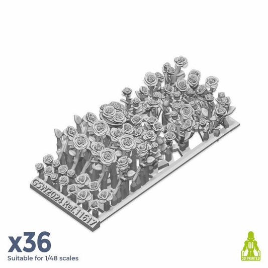 Resin bits of roses on a white background with Green Stuff World branding.