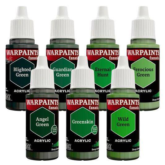 Set of Warpaints acrylic paint bottles in various green shades on a white background