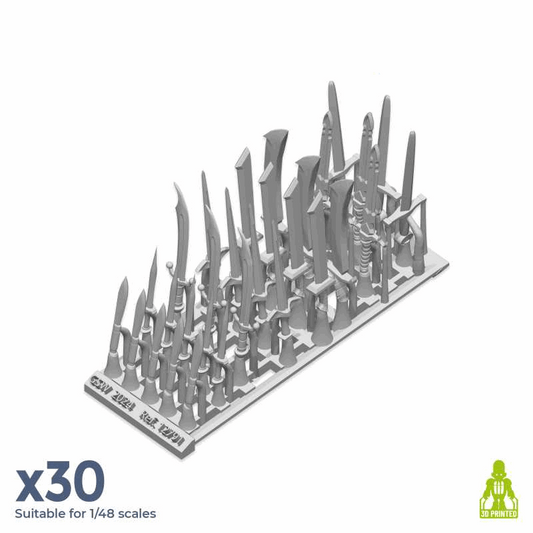 Set of resin sword and dagger bits by Green Stuff World on a white background