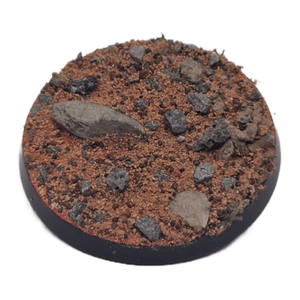 Round terrain piece with brown surface and gray rocks on a white background