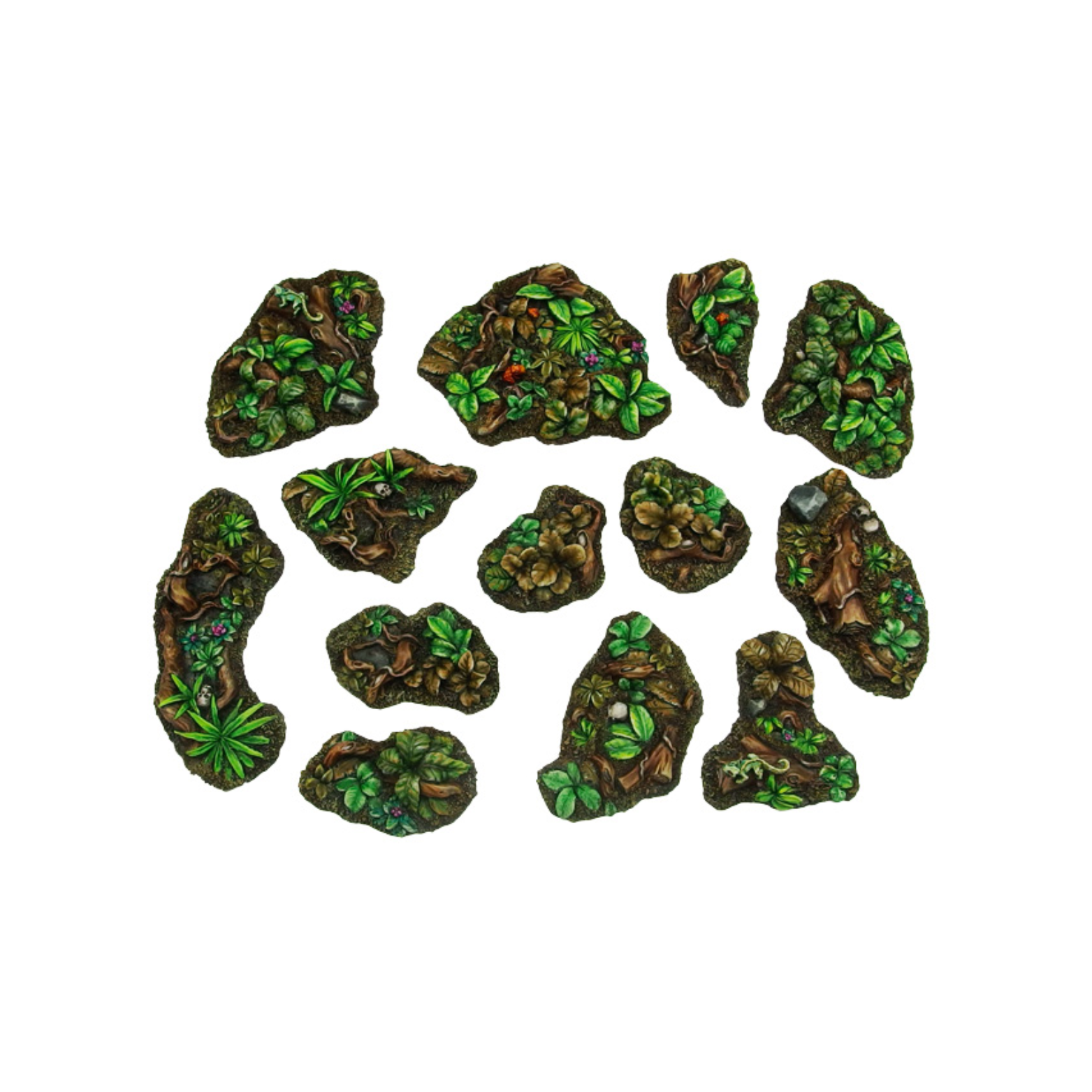Set of decorative rocks with green foliage on a white background