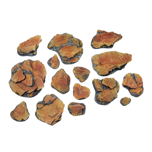 Collection of brown and gray rocks on a white background