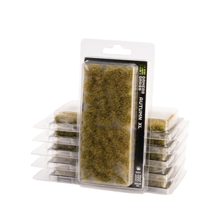Packaged artificial moss/grass texture pieces in a clear blister pack with a white backing card, shown with multiple stacked packs on a white background.