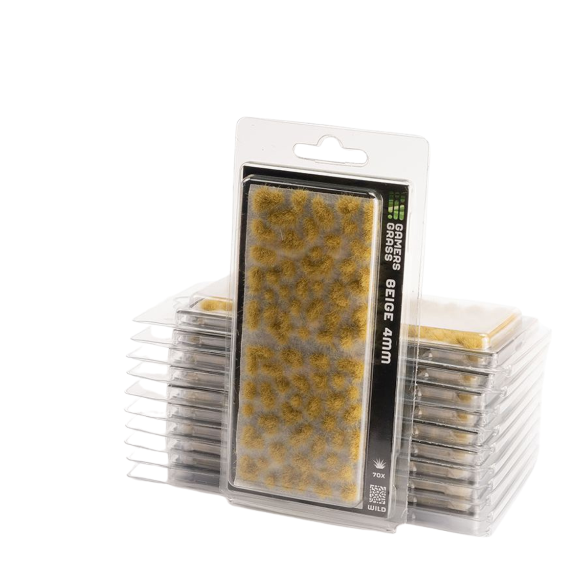 Packaged miniature terrain brush stumps for tabletop wargaming, featuring a single upright blister pack with a yellow-brown textured brush pad and stacks of identical packs behind it on a white background.