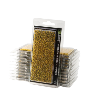 Packaged miniature grass seeds for Darguelin Ting Flowers by Games Workshop, shown in clear plastic blister packs with a black label, with stacks of similar packs behind on a white background.