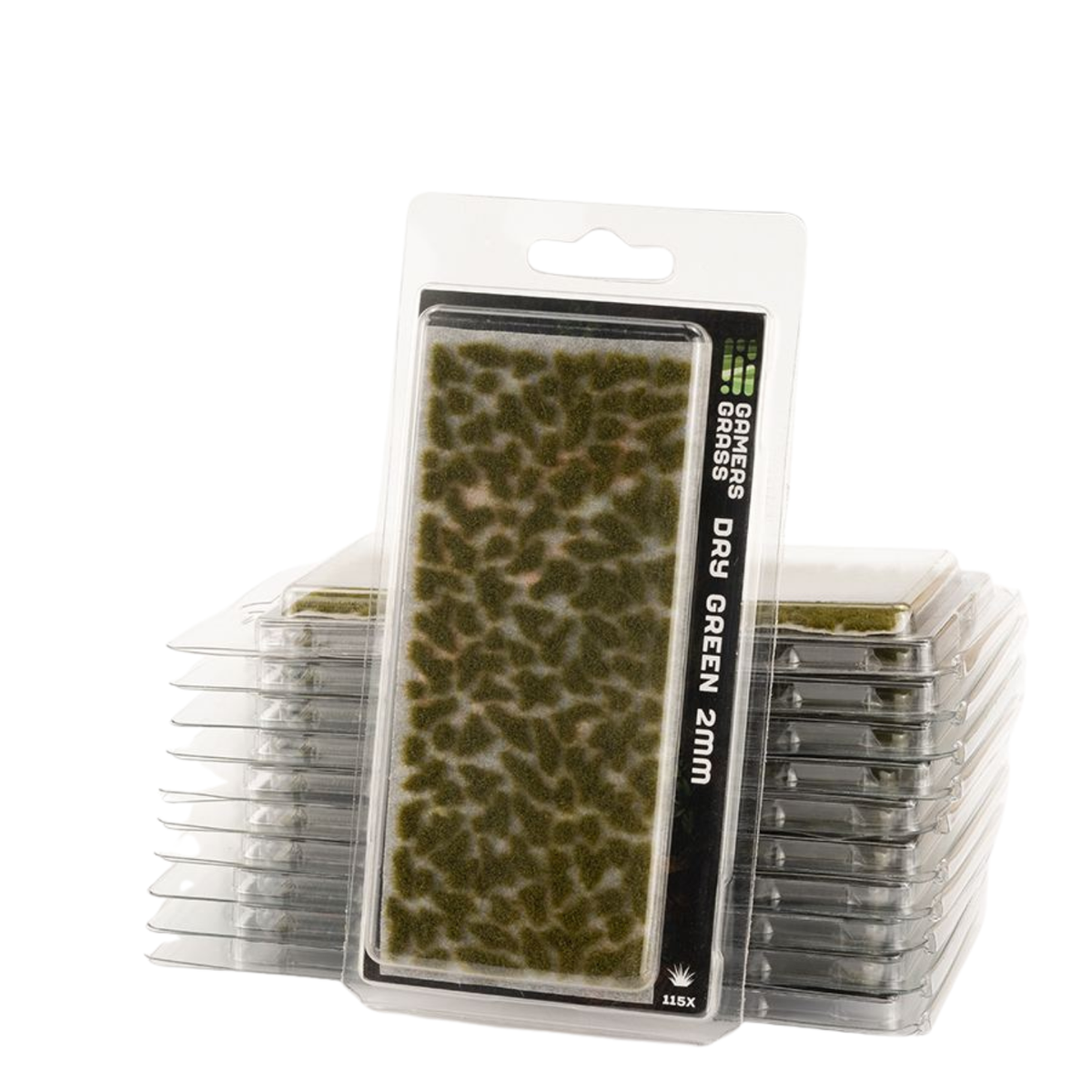 A pack of Grass Grass Dry Green 2MM tiles, with one tile in its clear plastic blister packaging standing in front of stacks of identical tiles on a white background.