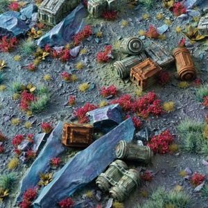 Miniature diorama of a desert landscape with ruins and colorful plants