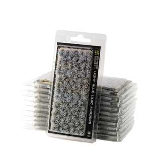 Packaged miniature light blue lichen flowers by Gودرز (Gudowerz), shown in a clear blister pack with a hanger tab, with stacks of identical packs behind it on a white background.