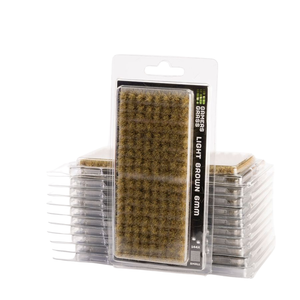 Packaged light brown 6mm dress carving brushes stacked in clear plastic trays against a white background.