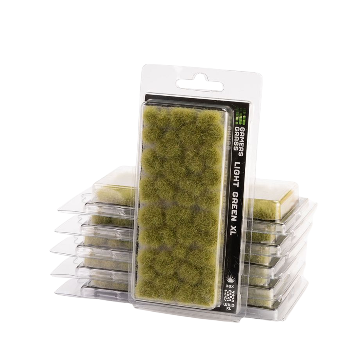 Packaged light green XL foam moss tiles by Grass Creations, shown in clear plastic blister packaging with a stack of similar packages behind it on a white background.