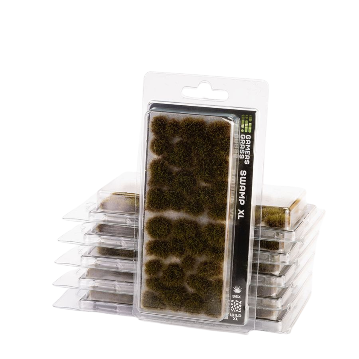 Packaged green mossy terrain pieces labeled 'Grass Series Small Stumps XL' in clear plastic blister packaging, with additional stacked packages visible behind on a white background.