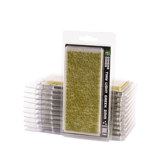 A pack of green 2mm fishing line guides in clear plastic blister packaging, with one guide in front and stacks of others behind it on a white background.